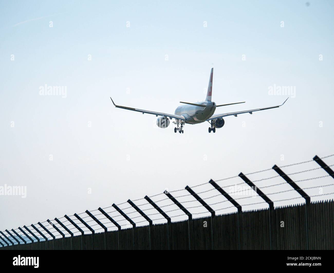 Swiss Airplane Landing at Zürich Airport Stock Photo