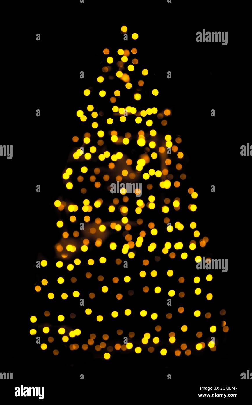 Blurred christmas tree lights isolated on black background Stock Photo