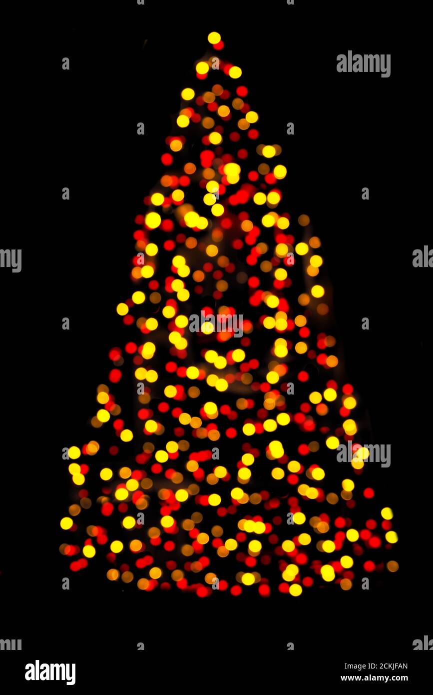 Blurred christmas tree lights isolated on black background Stock Photo