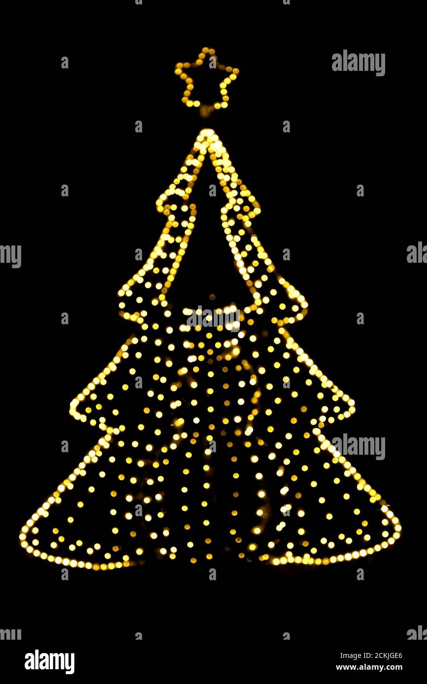 Blurred christmas tree lights isolated on black background Stock Photo