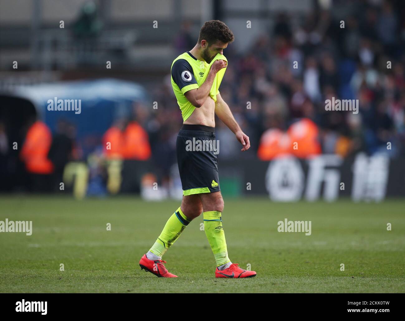 Soccer Football - Premier League - Crystal Palace v Huddersfield Town - Selhurst Park, London, Britain - March 30, 2019 Huddersfield Town's Christopher Schindler looks dejected after the match as they are relegated from the Premier League REUTERS/Hannah McKay EDITORIAL USE ONLY. No use with unauthorized audio, video, data, fixture lists, club/league logos or "live" services. Online in-match use limited to 75 images, no video emulation. No use in betting, games or single club/league/player publications. Please contact your account representative for further details. Stock Photo
