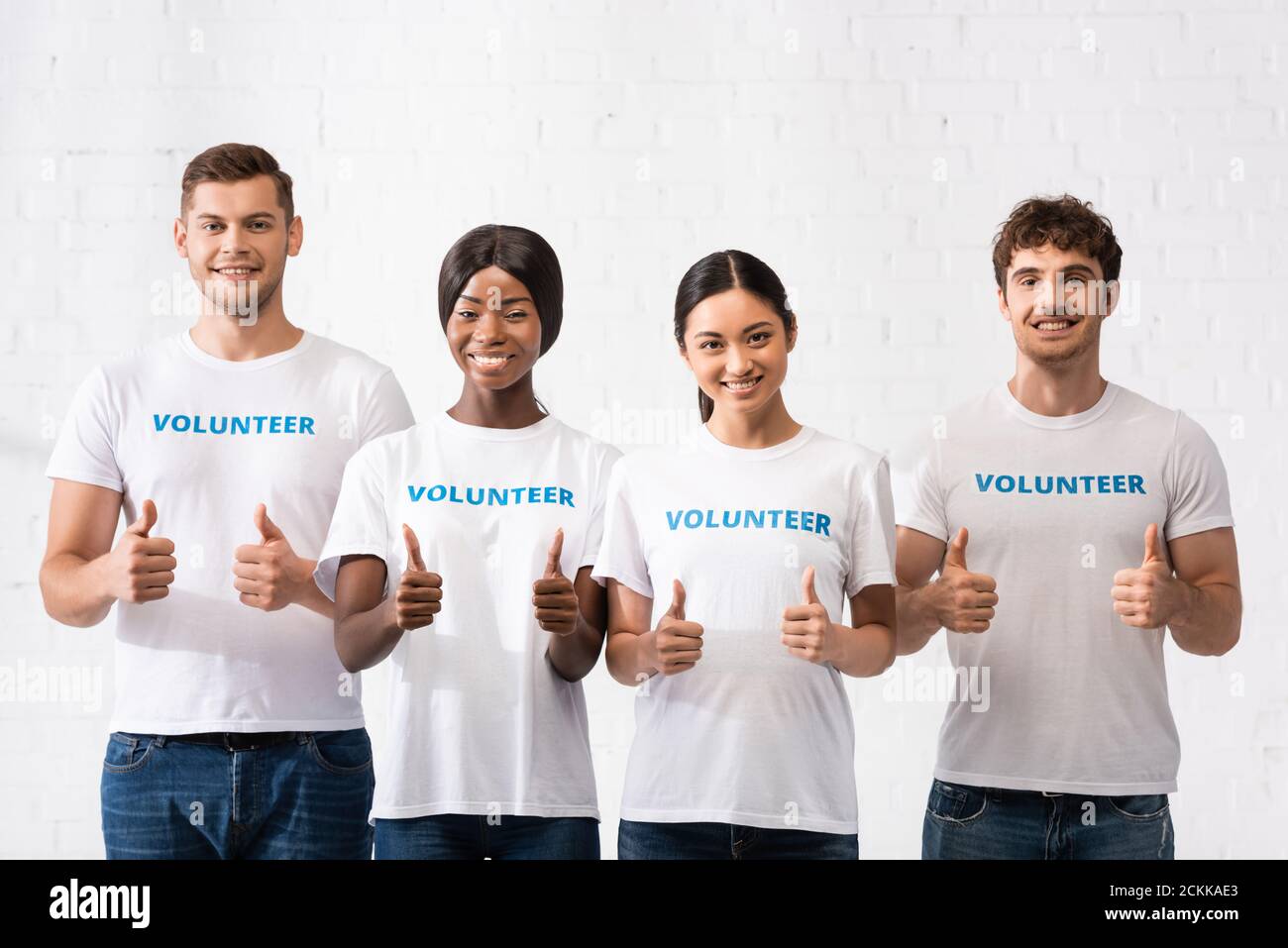 Young black men volunteering hi-res stock photography and images - Alamy