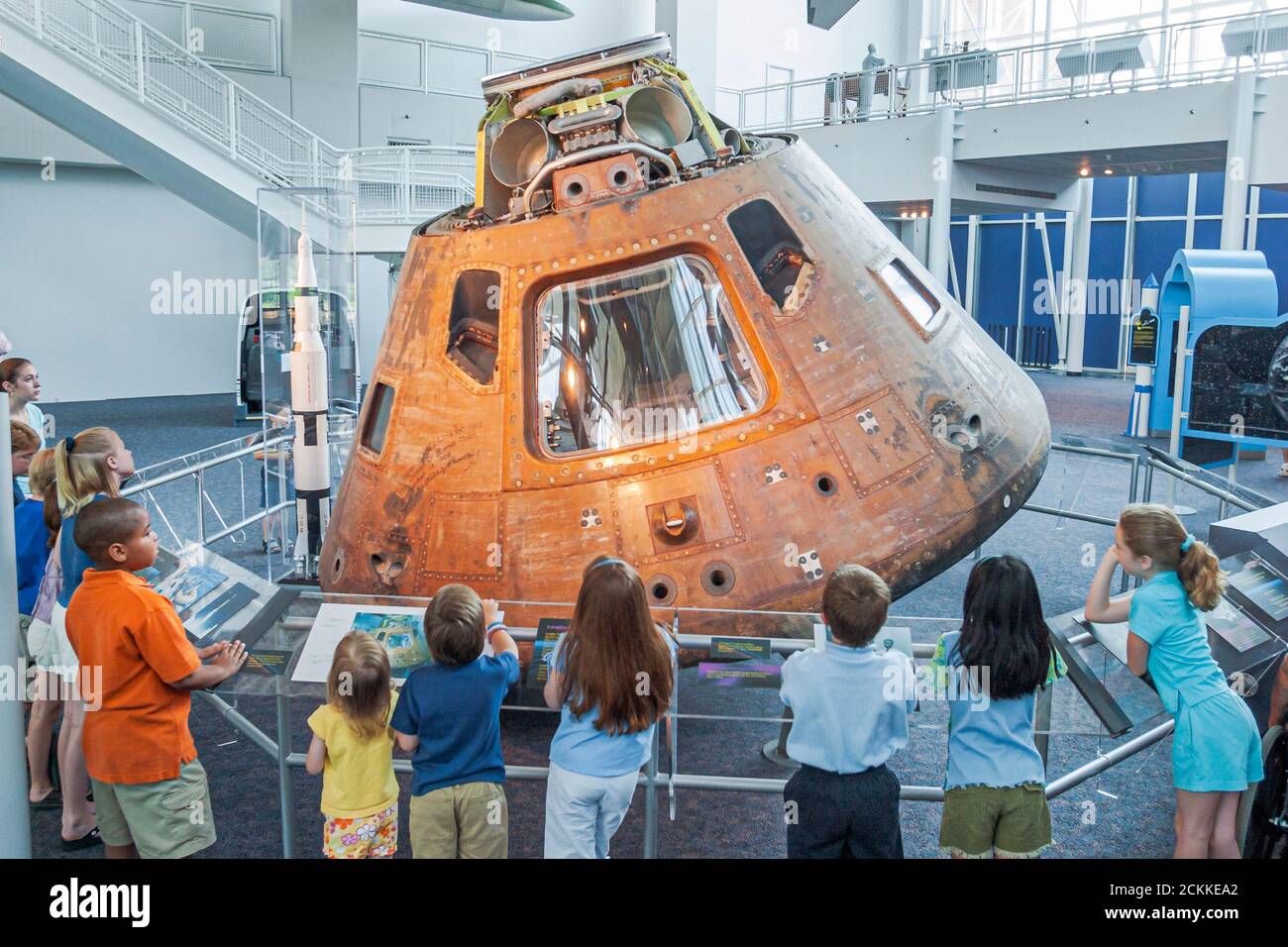 Hampton Virginia,Tidewater Area,Virginia Air and Space Center centre collection exhibit,satellite capsule students class field trip looking,visitors Stock Photo
