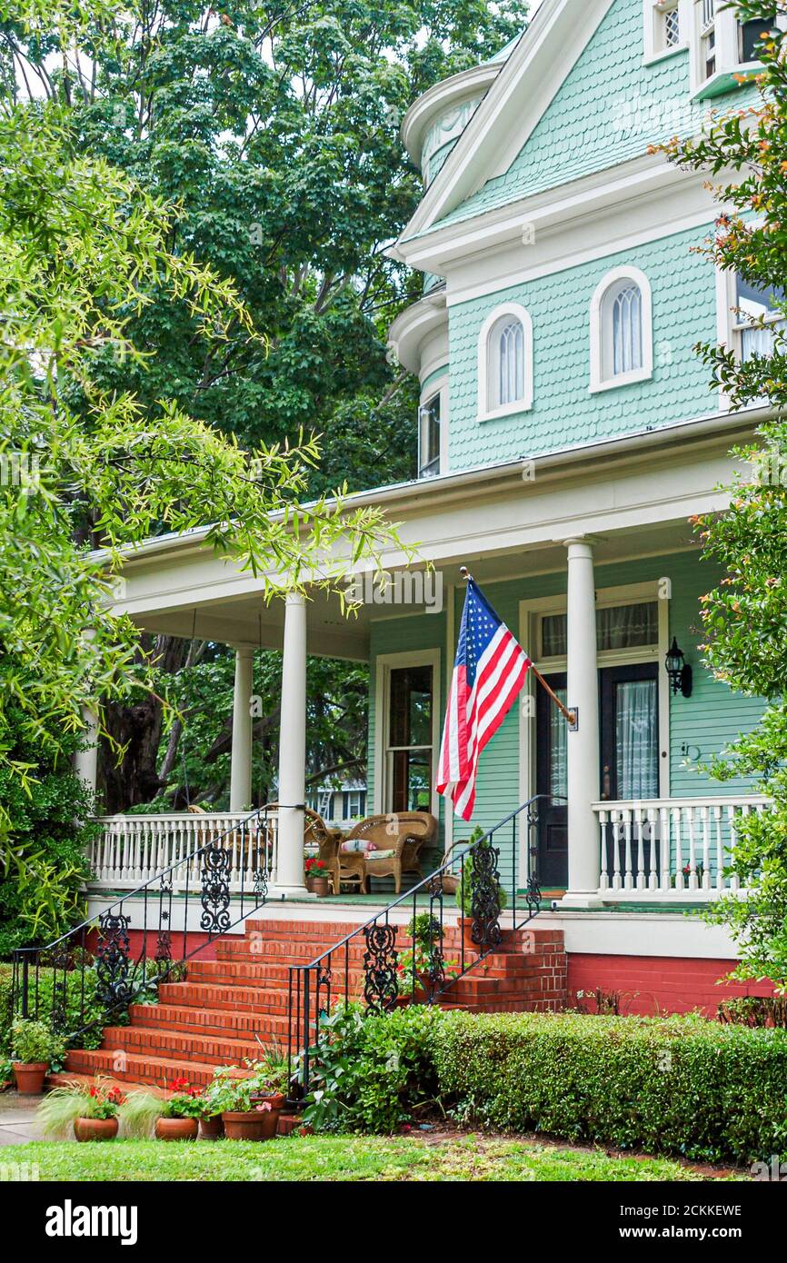 Hampton Virginia,Tidewater Area,historic home homes house houses residence neighborhood community,porch flag,scene in a photo,USA US Stock Photo