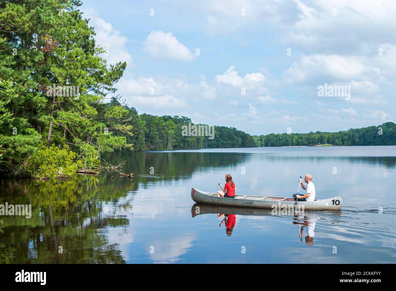 Virginia Newport News Park recreation nature natural scenery,man woman female couple canoe boat paddle paddling water Beaverdam Creek, Stock Photo
