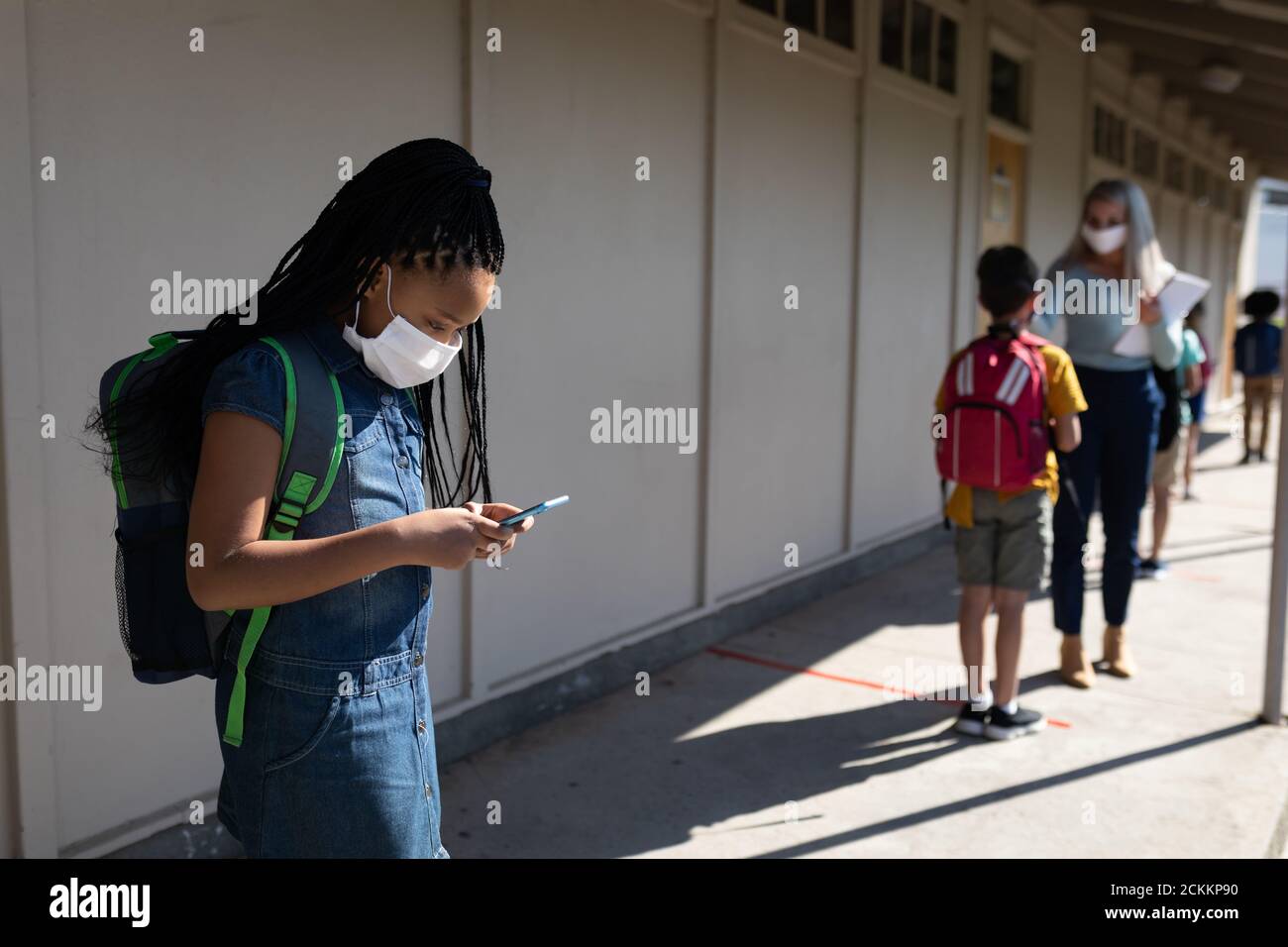 Girl wearing safety mask hi-res stock photography and images - Alamy