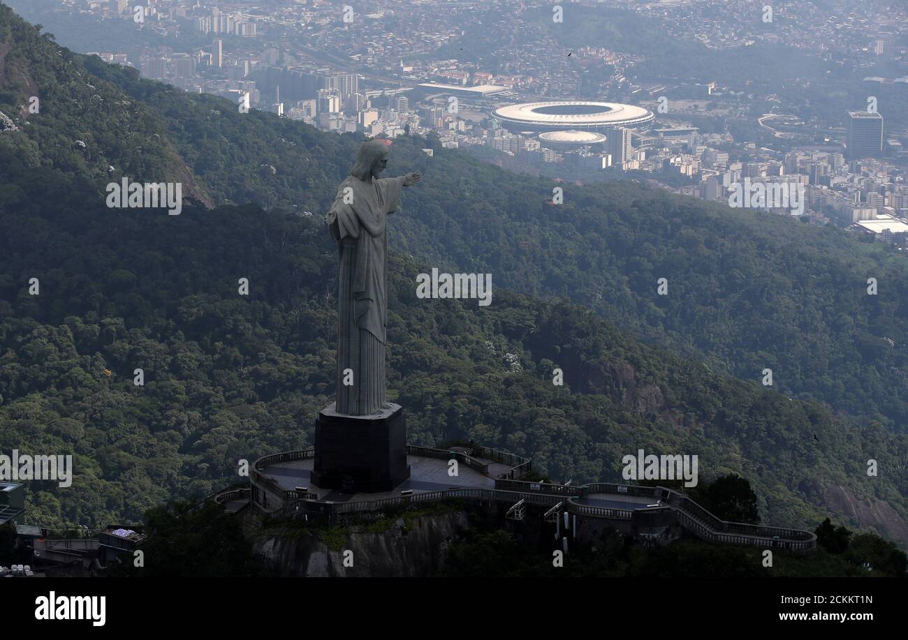 An Aerial View Shows The Christ The Redeemer Statue With The Maracana Stadium During The Coronavirus Disease Covid 19 Outbreak In Rio De Janeiro Brazil March 26 Reuters Ricardo Moraes Stock Photo Alamy