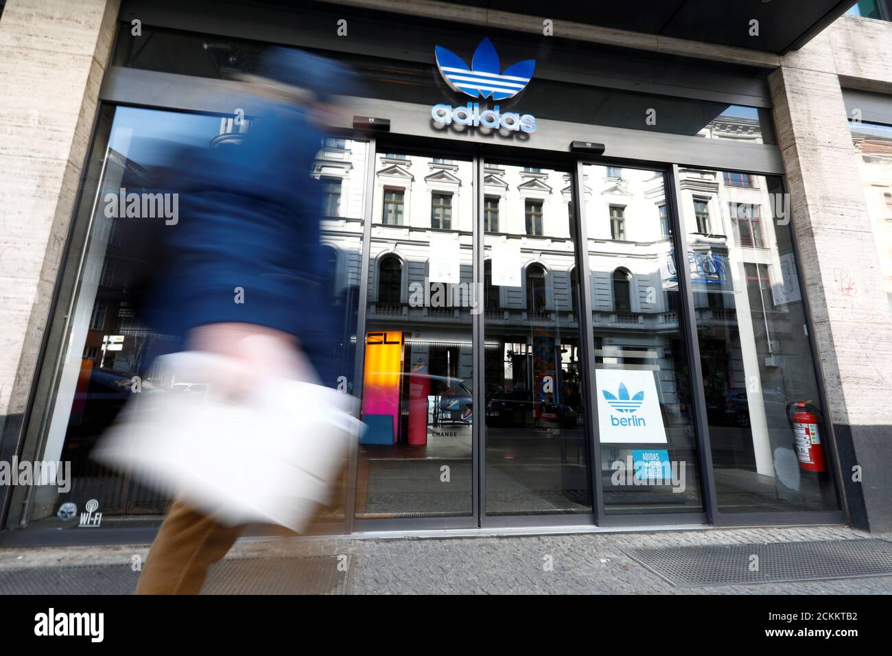A closed store of Adidas is pictured, following an outbreak of the  coronavirus disease (COVID-19), in Berlin, Germany March 27, 2020.  REUTERS/Michele Tantussi Stock Photo - Alamy