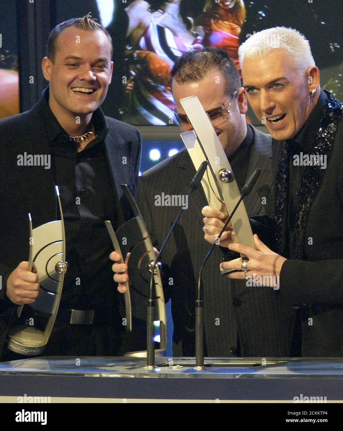 GERMAN SINGERS RICK J. JORDAN, AXEL COON AND H.P. BAXXTER OF 'SCOOTER' ACCEPT THE MUSIC AWARDS IN BERLIN. singers Rick Jordan (L-R), Axel Coon and H.P. Baxxter of