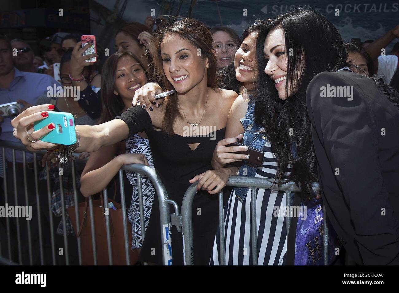 Actress Laura Prepon Poses For A Photo With Fans In Times Square In The