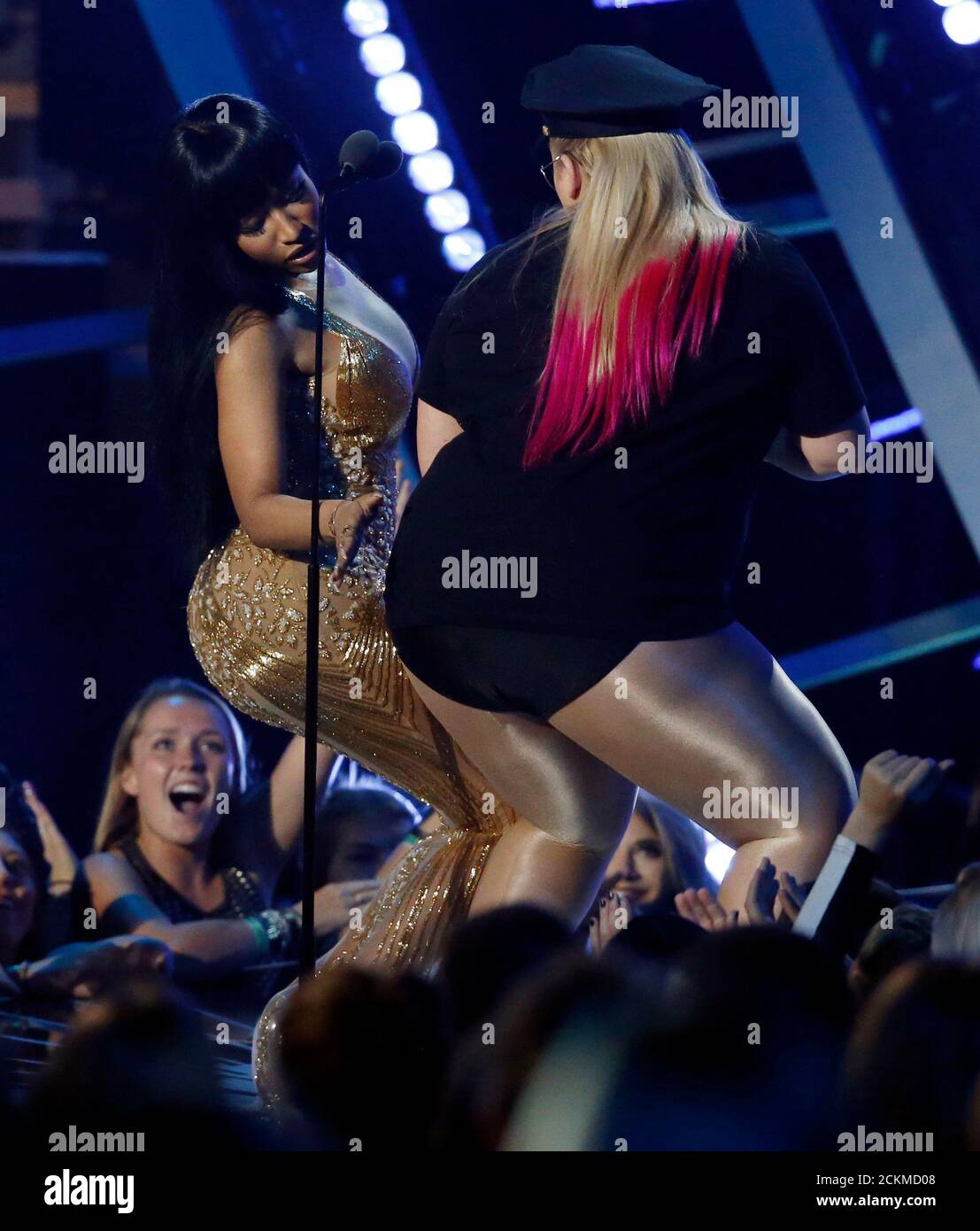 Nicki Minaj (L) and presenter Rebel Wilson dance as Minaj accepts the award  for best hip hop video at the 2015 MTV Video Music Awards in Los Angeles,  California August 30, 2015.