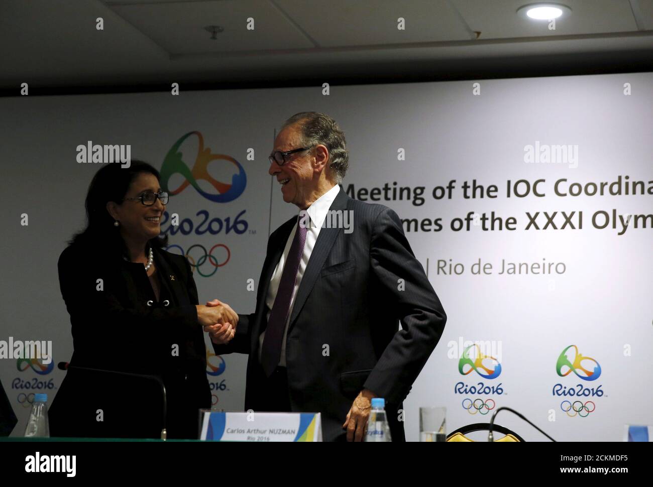 Nawal El Moutawakel (L), chairman of the International Olympic Committee (IOC) Coordination Commission and Rio 2016 Olympic Games Organising Committee President Carlos Arthur Nuzman shake hands after a news conference during the IOC Coordination Commission's 10th visit to Rio de Janeiro, Brazil, April 13, 2016. REUTERS/Pilar Olivares Stock Photo