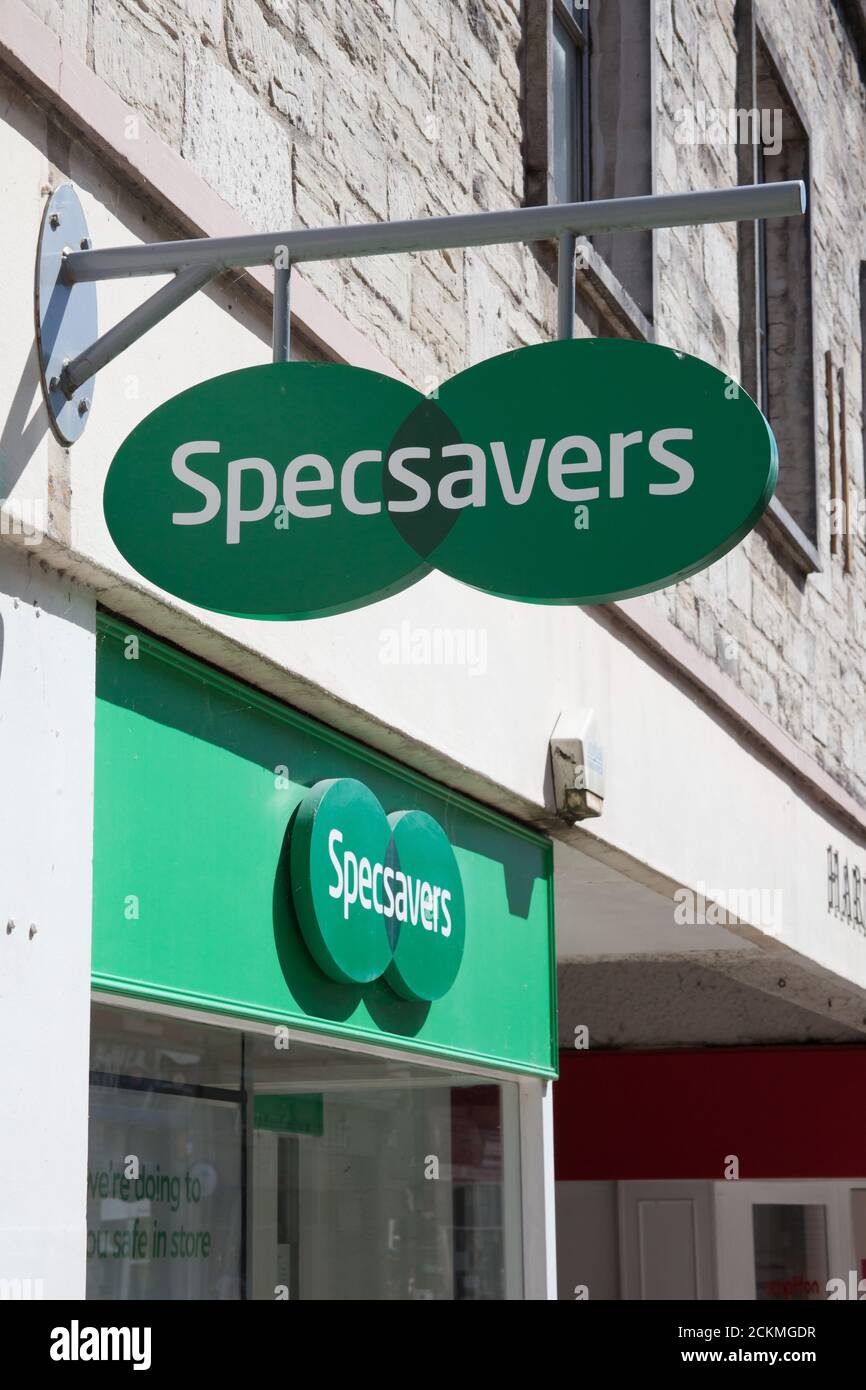 The Specsavers sign on an opticians wall in the UK Stock Photo