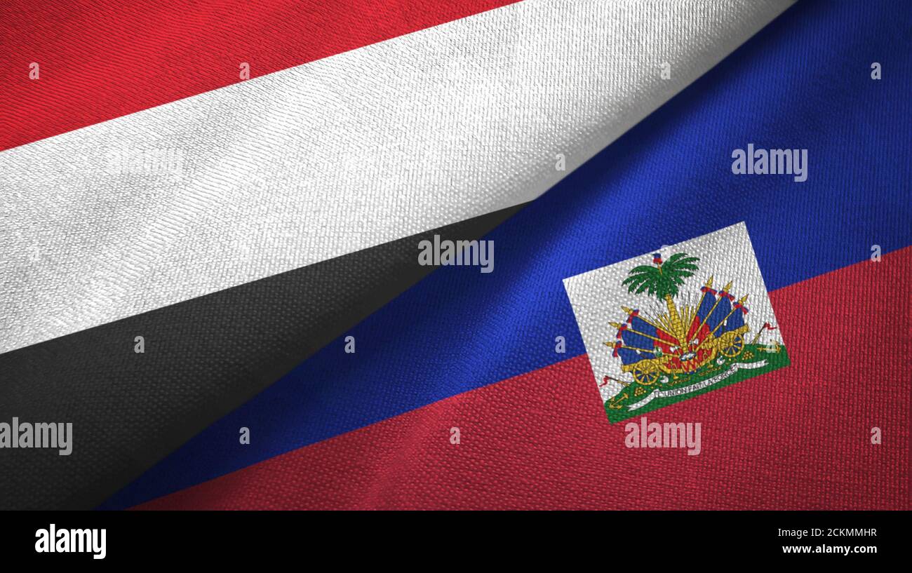Yemen and Haiti two flags textile cloth, fabric texture Stock Photo