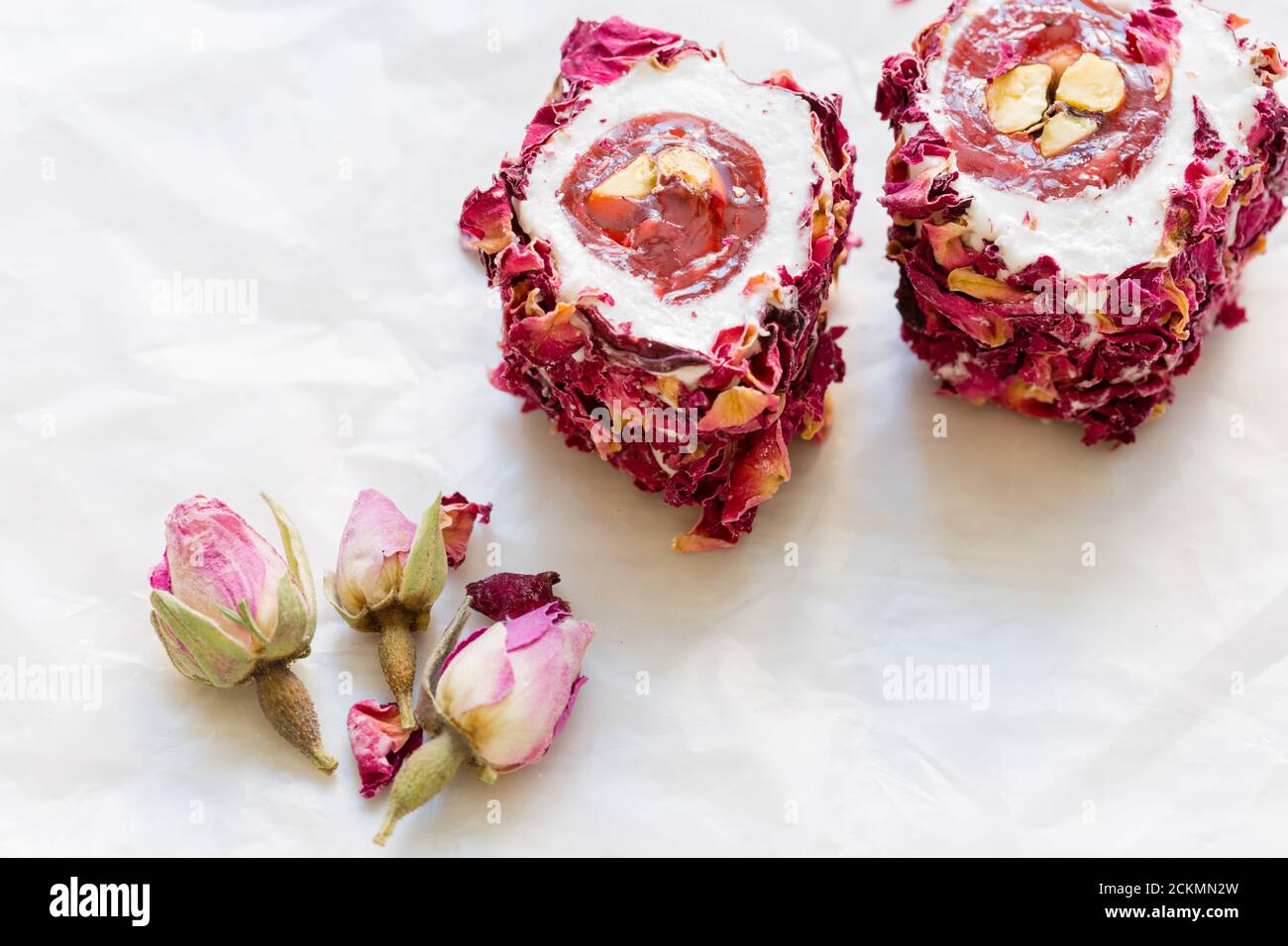 Turkish delight with nuts and rose leaves. Rahat lokum, traditional Turkish  sweets, Turkey Stock Photo - Alamy