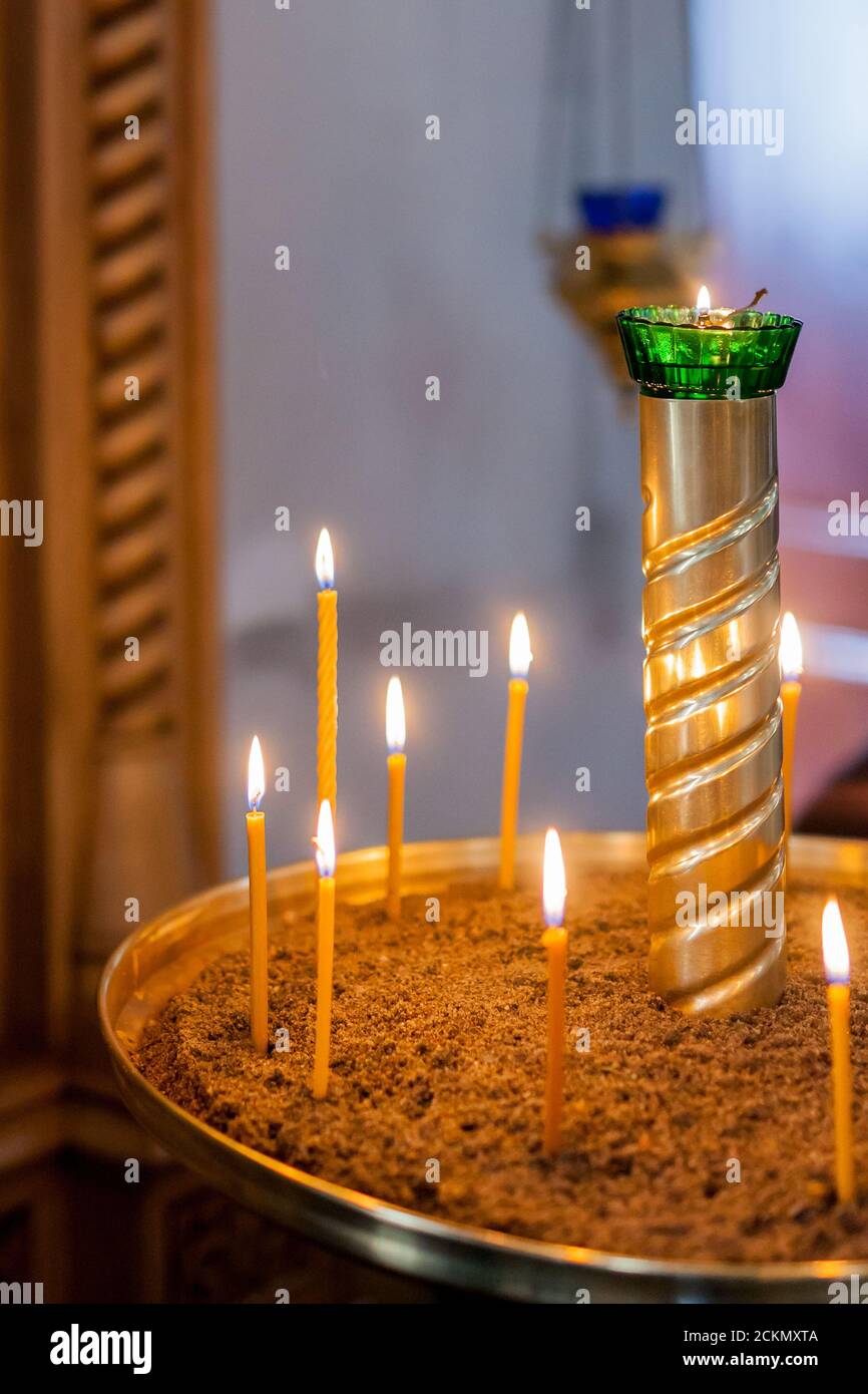 MURMANSK RUSSIA - 2014 SEPTEMBER 14. Close up with the candles inside the Church of the Savior on the Waters. Stock Photo