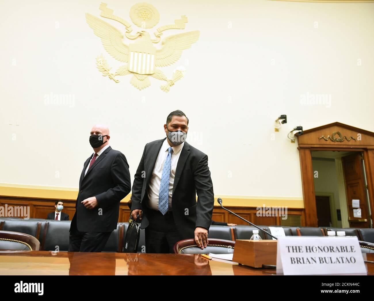 Washington, United States. 16th Sep, 2020. Brian Bulatao (C), Under Secretary of State for Management and R. Clarke Cooper (R), Assistant Secretary of State for Political-Military Affairs, prepare to testify before a House Committee on Foreign Affairs hearing looking into the firing of State Department Inspector General Steven Linick, on Capitol Hill in Washington, DC on Wednesday, September 16, 2020. Photo by Kevin Dietsch/UPI Credit: UPI/Alamy Live News Stock Photo