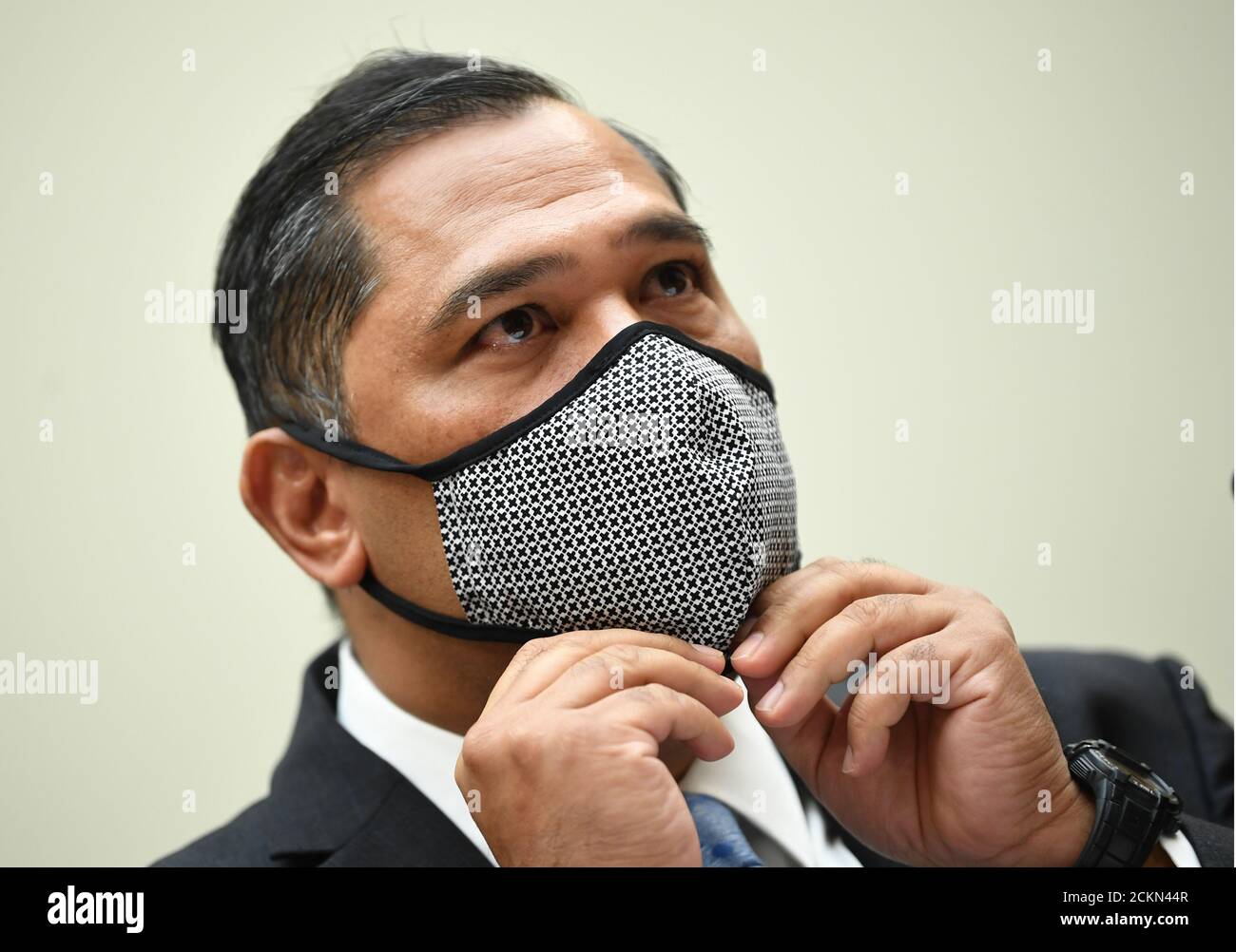 Brian Bulatao, Under Secretary of State for Management, adjusts his face mask as he testifies before a House Committee on Foreign Affairs hearing looking into the firing of State Department Inspector General Steven Linick, on Capitol Hill in Washington, DC on Wednesday, September 16, 2020. The foreign affairs committee issued the subpoenas as part of the panel's probe into accusations that Linick was fired while investigating Secretary of State Mike Pompeo's role in a controversial $8 billion weapons sale to Saudi Arabia. Photo by Kevin Dietsch/UPI Stock Photo