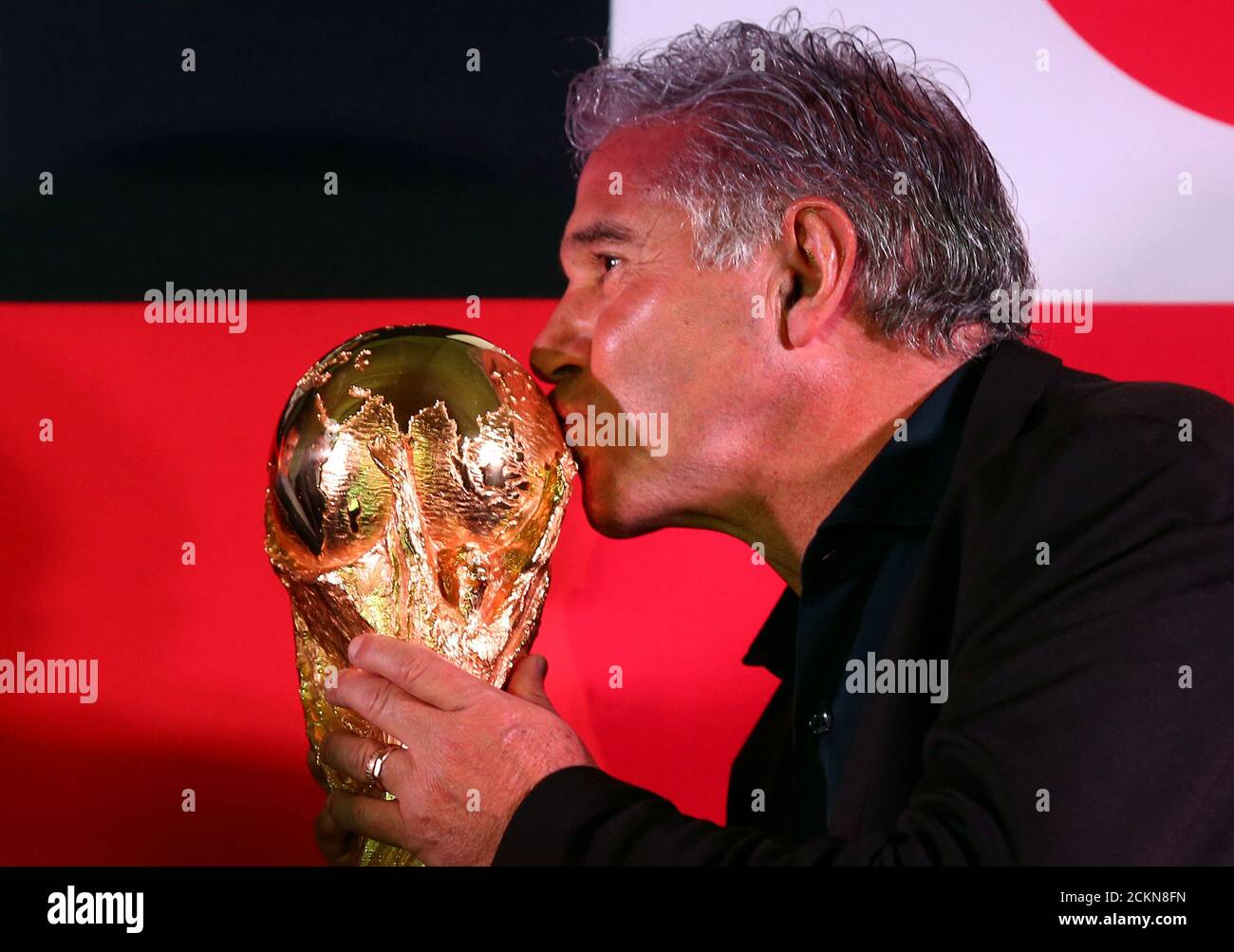 Argentina S Former National Soccer Player Jorge Burruchaga Member Of The 1986 World Champion Team Kisses The Fifa Soccer World Cup Trophy In Buenos Aires Argentina March 29 2018 Reuters Marcos Brindicci Stock Photo Alamy