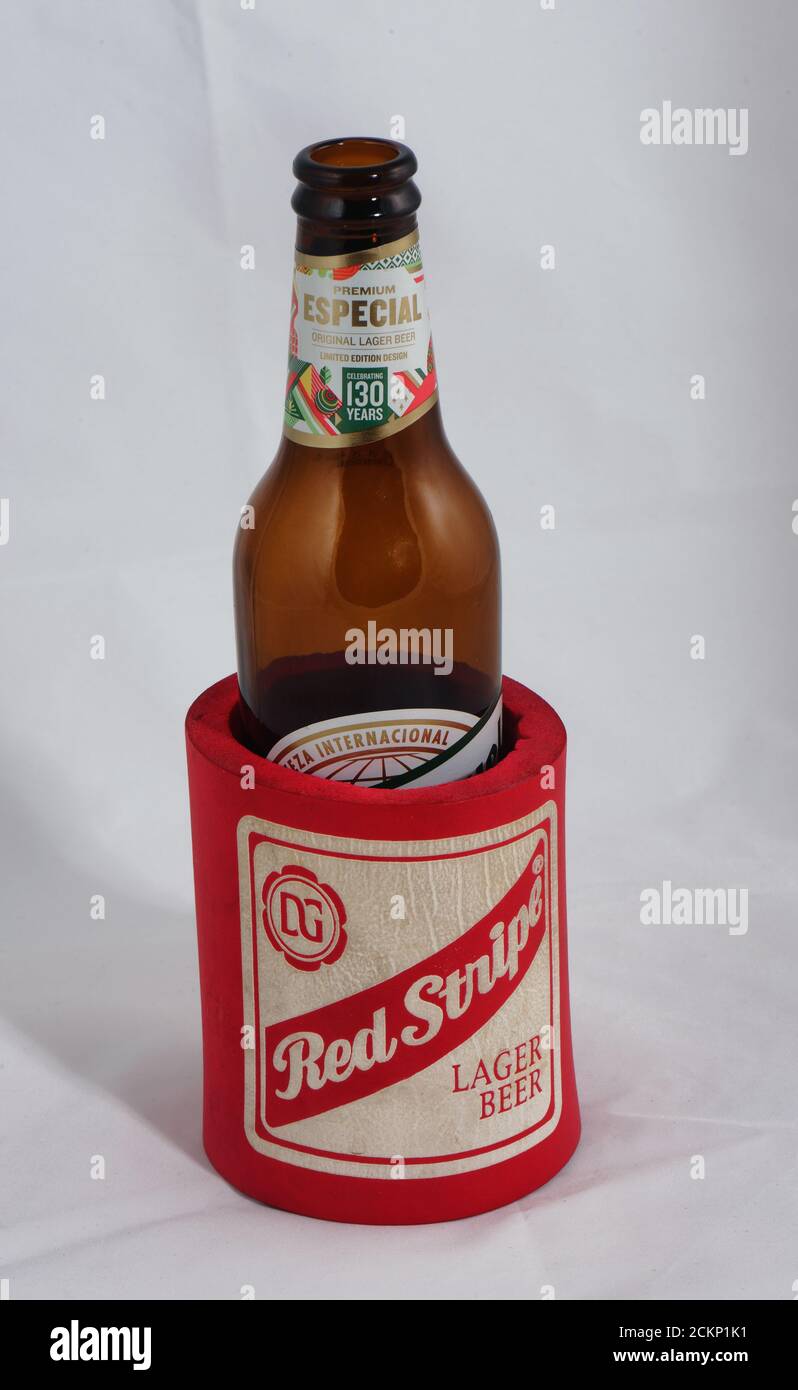 Red stripe beer stubby holder a drinks cooler for beer Stock Photo