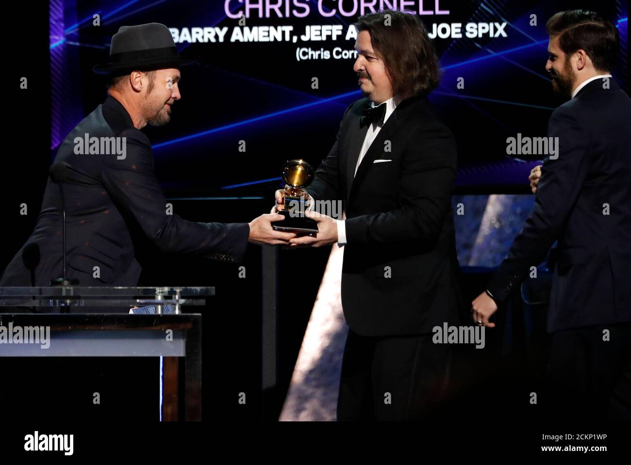 62nd Grammy Awards - Show - Los Angeles, California, U.S., January 26, 2020 - Barry Ament, Jeff Ament and Joe Spix accept the award for Best Recording Package winner for 'Chris Cornell.' REUTERS/Mario Anzuoni Stock Photo