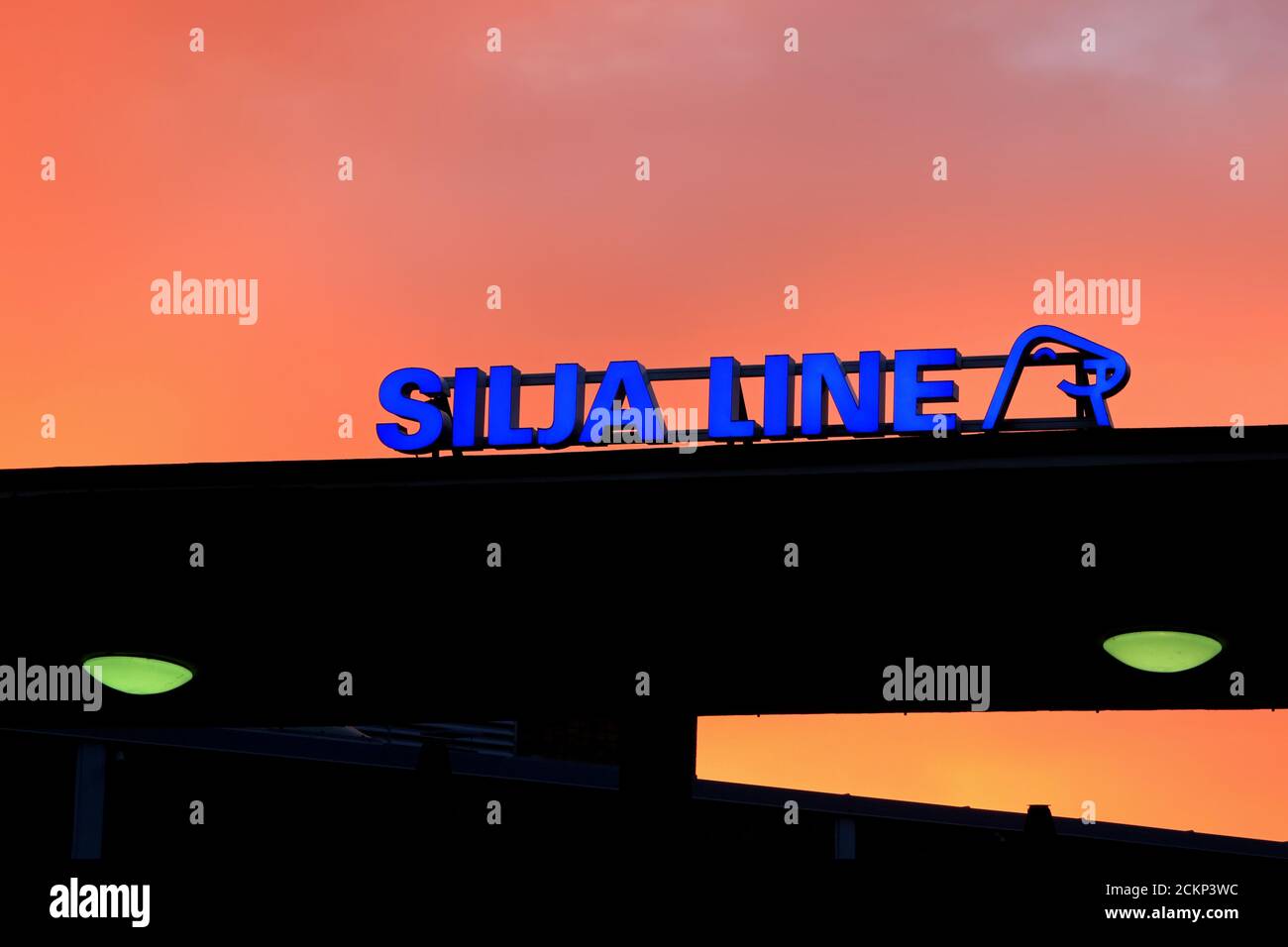Logo Silja Line against red sunrise sky at Port of Helsinki ferry terminal, Finland. September 15, 2020. Stock Photo