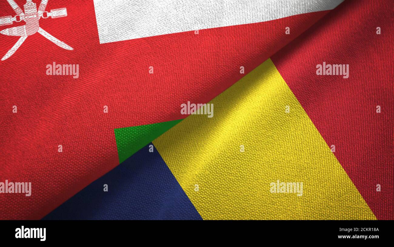Oman and Chad two flags textile cloth, fabric texture Stock Photo