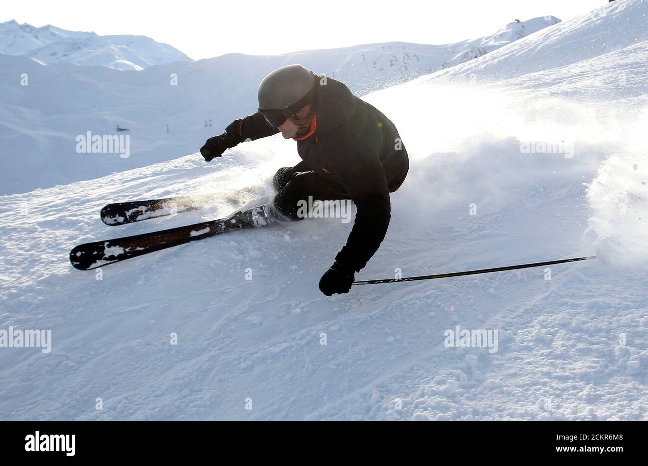 Simon Jacomet, ski designer and founder of Swiss ski producer Zai races  down a piste to test a pair of Zai skis in the central Swiss town of  Disentis February 4, 2010.