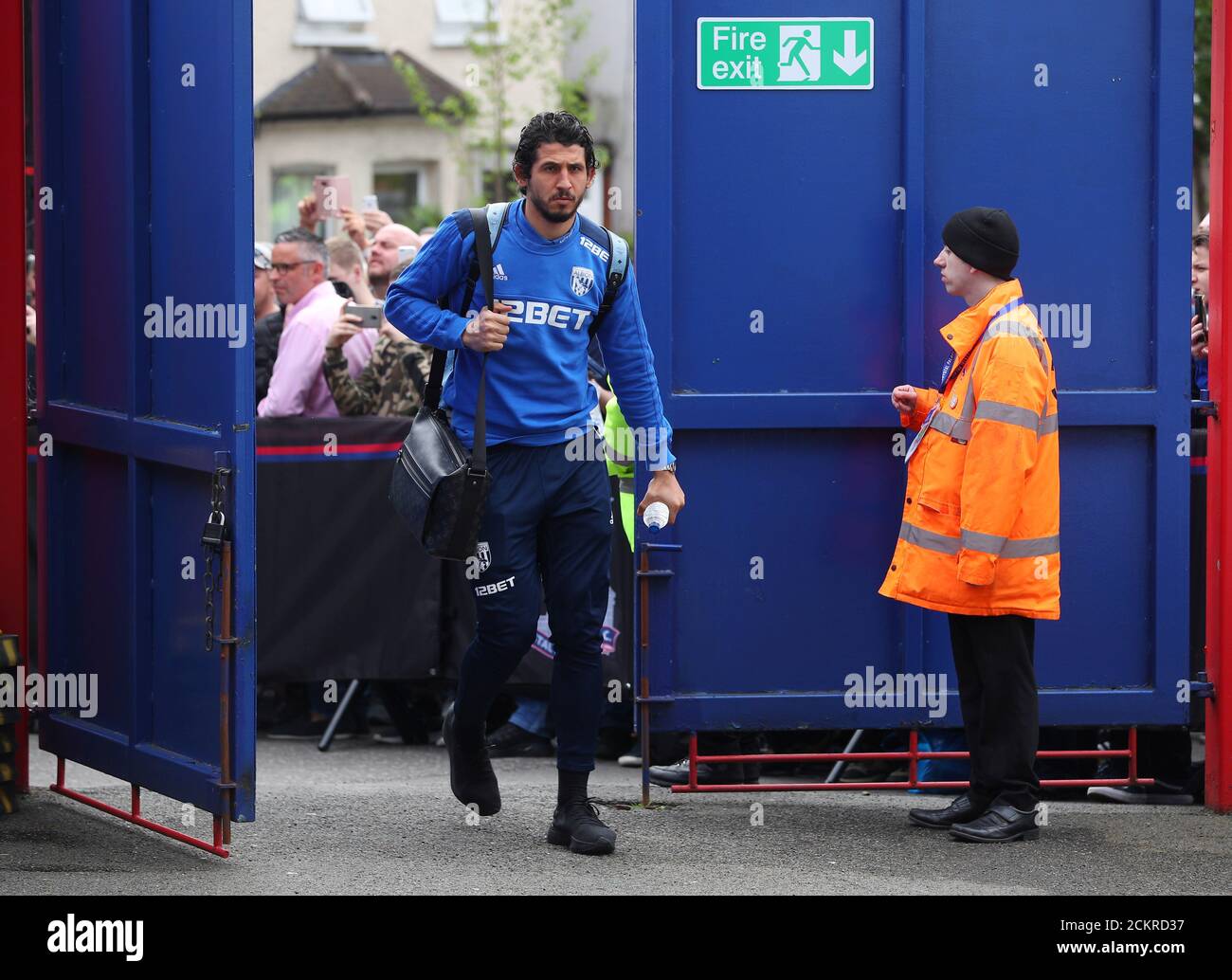 Soccer Football - Premier League - Crystal Palace vs West Bromwich Albion - Selhurst Park, London, Britain - May 13, 2018   West Bromwich Albion's Ahmed Hegazi arrives at the stadium before the match   REUTERS/Hannah McKay    EDITORIAL USE ONLY. No use with unauthorized audio, video, data, fixture lists, club/league logos or 'live' services. Online in-match use limited to 75 images, no video emulation. No use in betting, games or single club/league/player publications.  Please contact your account representative for further details. Stock Photo