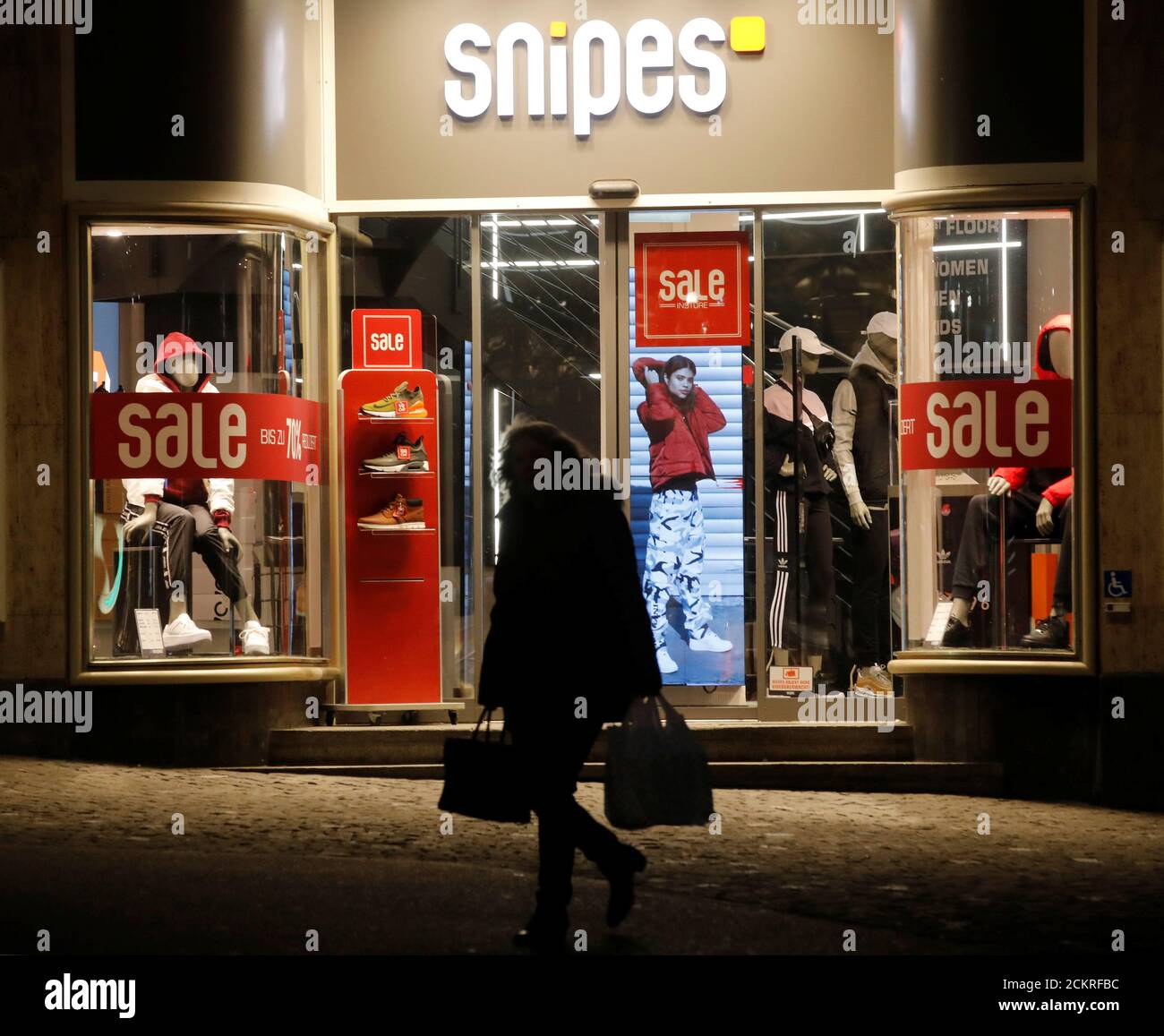 Sale discounts are offered on a display window of a Snipes fashion store in  Zurich, Switzerland January 7, 2019. Picture taken January 7, 2019.  REUTERS/Arnd Wiegmann Stock Photo - Alamy