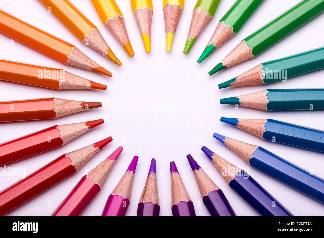 Circular arranged colour pencils constituting the colour wheel Stock Photo