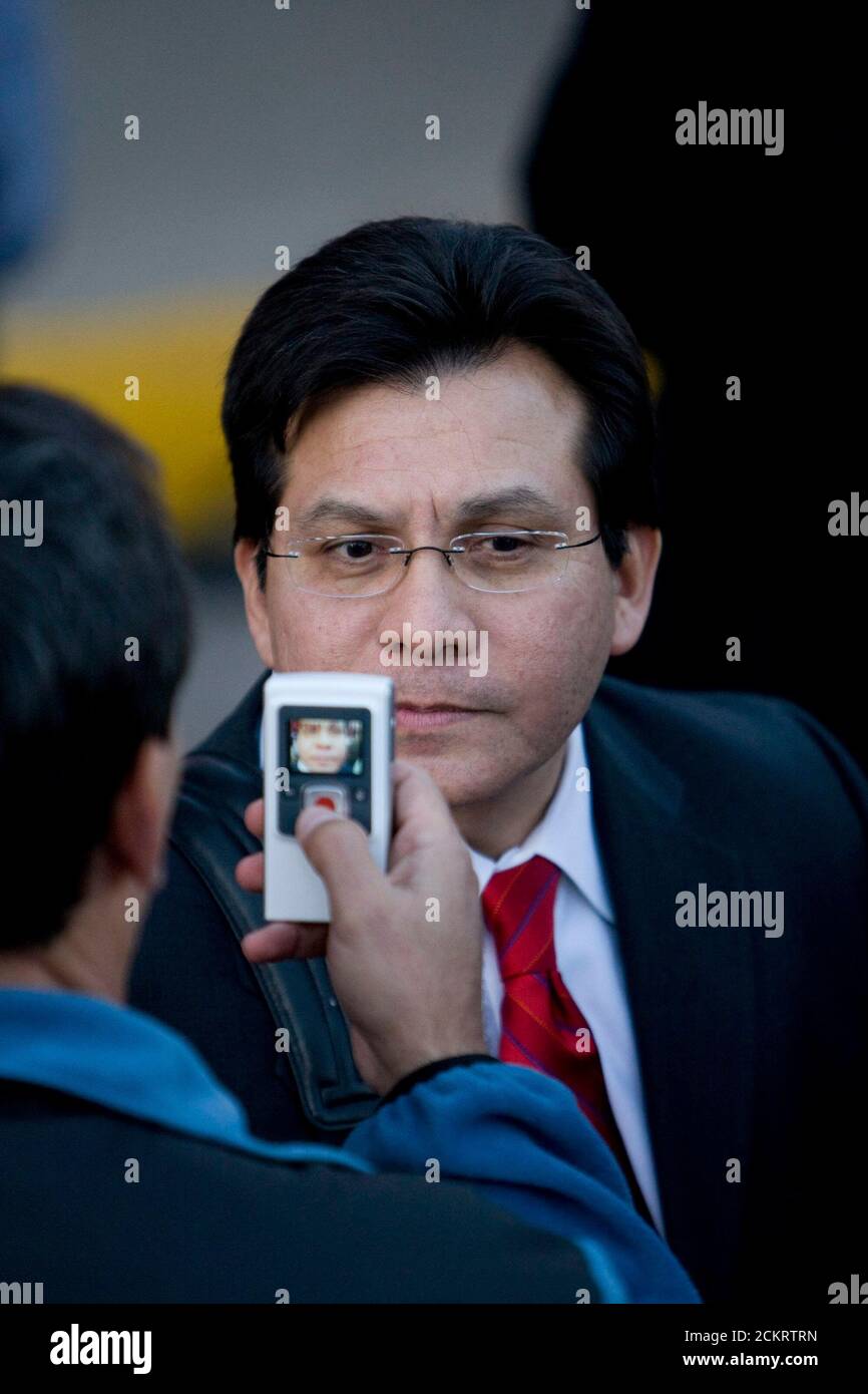 Midland, Texas January 20, 2009: Former Attorney General Alberto Gonzales is photographed by one of the 20,000 well-wishers in downtown Midland Tuesday that gathered to greet former President George W. Bush and wife Laura after their return from Washington.  ©Bob Daemmrich Stock Photo