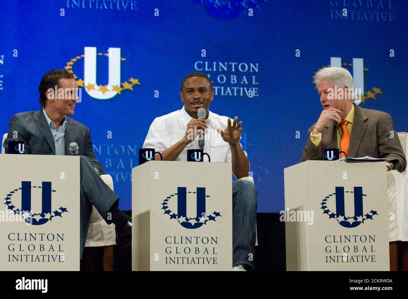 Austin, TX February 14, 2009: Former President Bill Clinton (r) hosts the second annual Clinton Global Initiative University, a conference bringing together more than 1,000 students to take action on global challenges such as poverty, hunger, energy, climate change and global health. Left to right are actor Matthew McConaughey, NFL player Nnamdi Asomugha and Clinton.  ©Bob Daemmrich Stock Photo