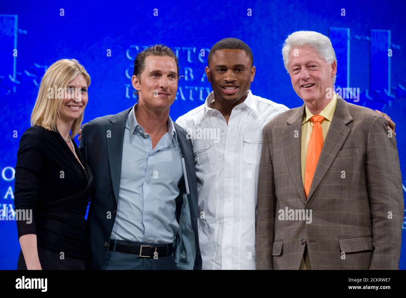 Austin, TX February 14, 2009: Former President Bill Clinton (r) hosts the second-annual Clinton Global Initiative University, a conference bringing together more than 1,000 students to take action on global challenges such as poverty, hunger, energy, climate change and global health. Left to right are Marie Tillman, actor Matthew McConaughey, NFL player Nnamdi Asomugha and Clinton. ©Bob Daemmrich Stock Photo
