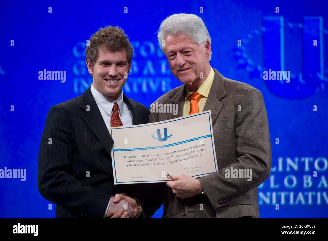 Austin, TX February 14, 2009: Former President Bill Clinton hands out an award at the second-annual Clinton Global Initiative University, a conference bringing together students to take action on global challenges such as poverty, hunger, energy, climate change and global health. The program is patterned after Clinton Global Initiative Foundation formed by President Bill Clinton. ©Bob Daemmrich Stock Photo