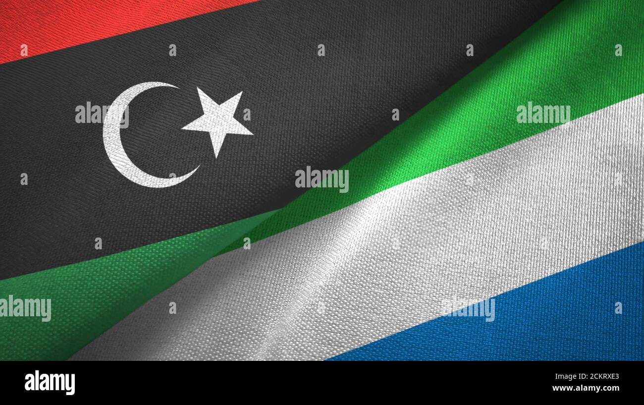 Libya and Sierra Leone two flags textile cloth, fabric texture Stock Photo