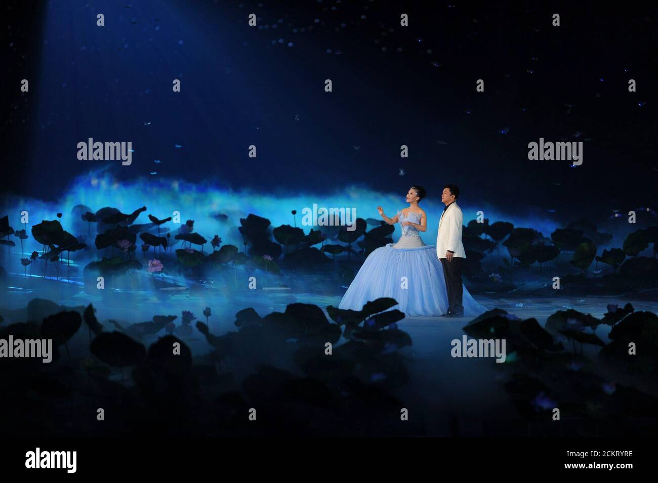 Beijing, China  September 6, 2008: Chinese singers Tan Jing (left) and Fan Jingma (right) perform at the Opening Ceremonies of the Beijing Paralympics at China's National Stadium, known as the Bird's Nest.  ©Bob Daemmrich Stock Photo
