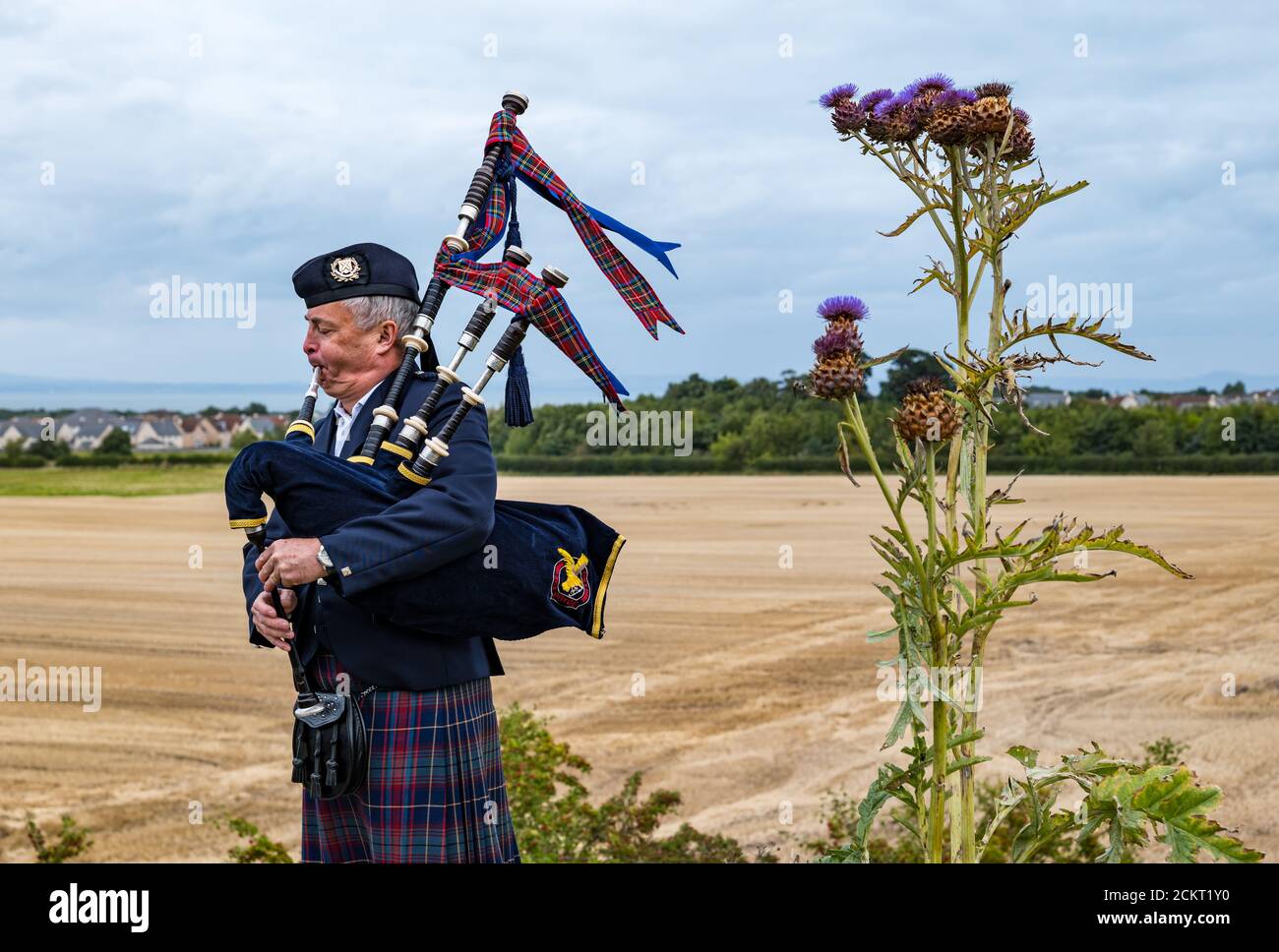 Piper playing bagpipes at Battle of Pinkie Cleugh commemoration ceremony, East Lothian, Scotland, UK Stock Photo