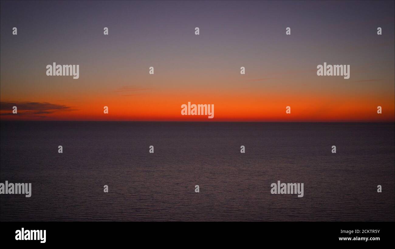Beautiful red sunset in sea hi-res stock photography and images - Alamy