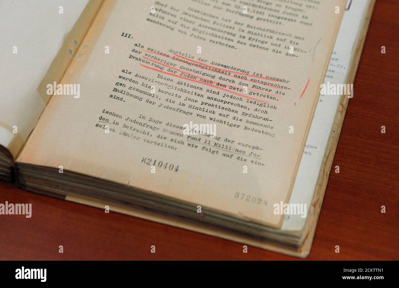 Picture shows a page of the Nazi Germany foreign ministry's copy of the 1942 Wannsee conference protocol in Berlin, October 28, 2010. The document was exhibited during a ceremony where German Foreign Minister Guido Westerwelle received from its authors the historical study 'Das Amt und die Vergangenheit' (The Office and the Past), which chronicles how the Nazi Germany's foreign ministry was aware of the Nazi mass murder of Jews and was 'actively involved', debunking a myth that most diplomats had managed to keep their hands clean. Senior officials of the Nazi regime gathered in January 1942 du Stock Photo