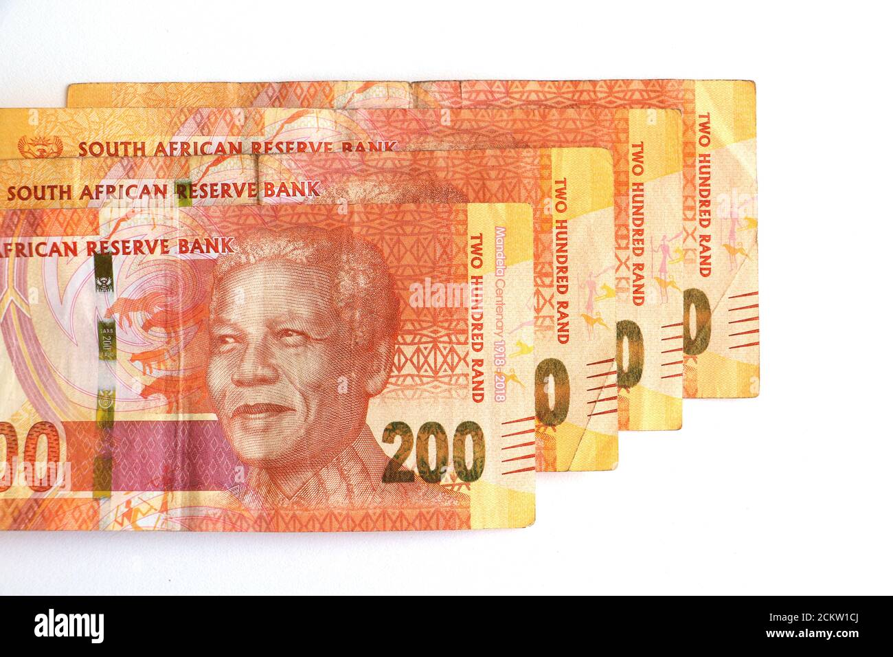 An isolated pile of two hundred rand notes currency from South Africa Stock Photo