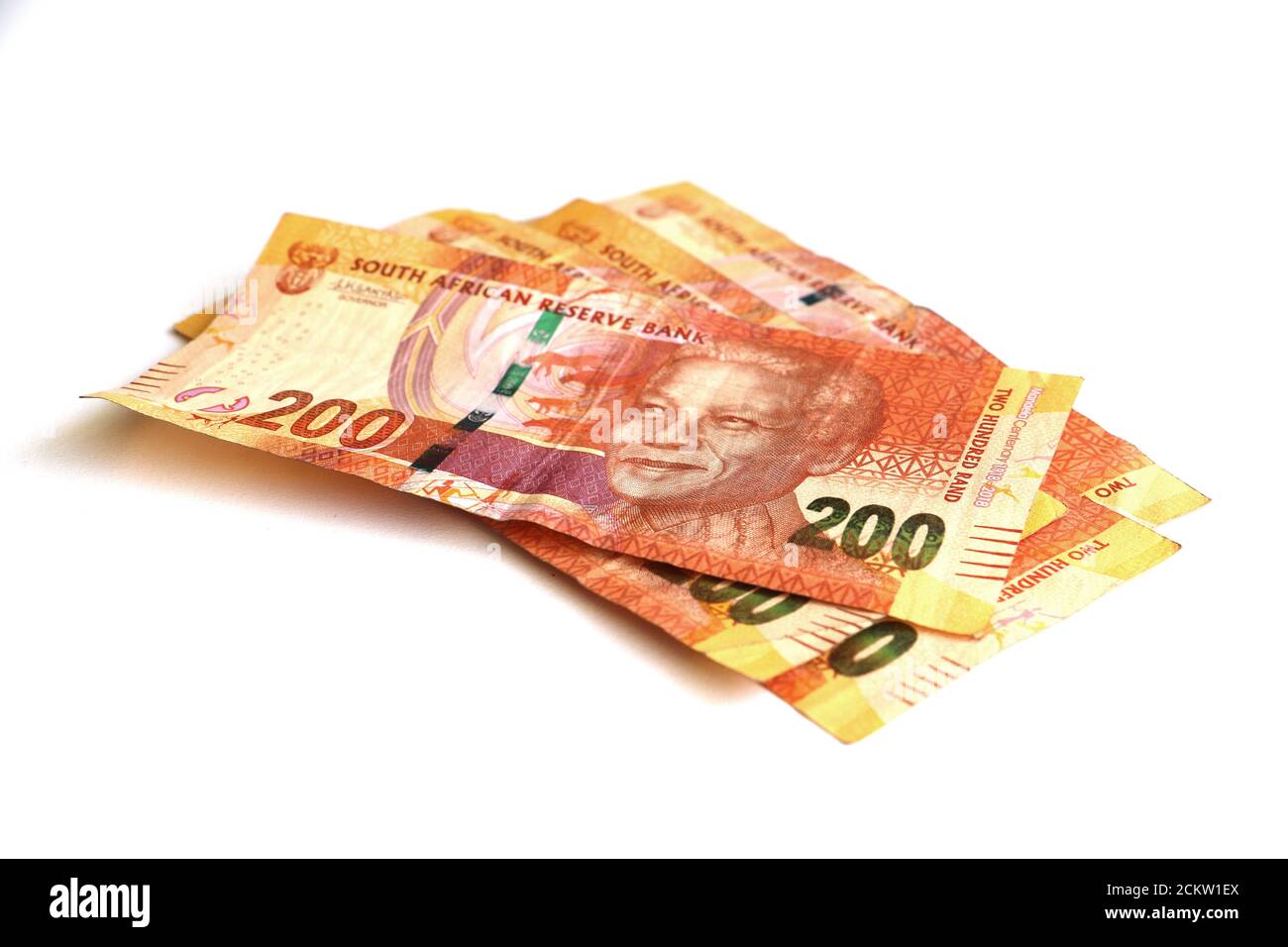 An isolated pile of two hundred rand notes currency from South Africa Stock Photo