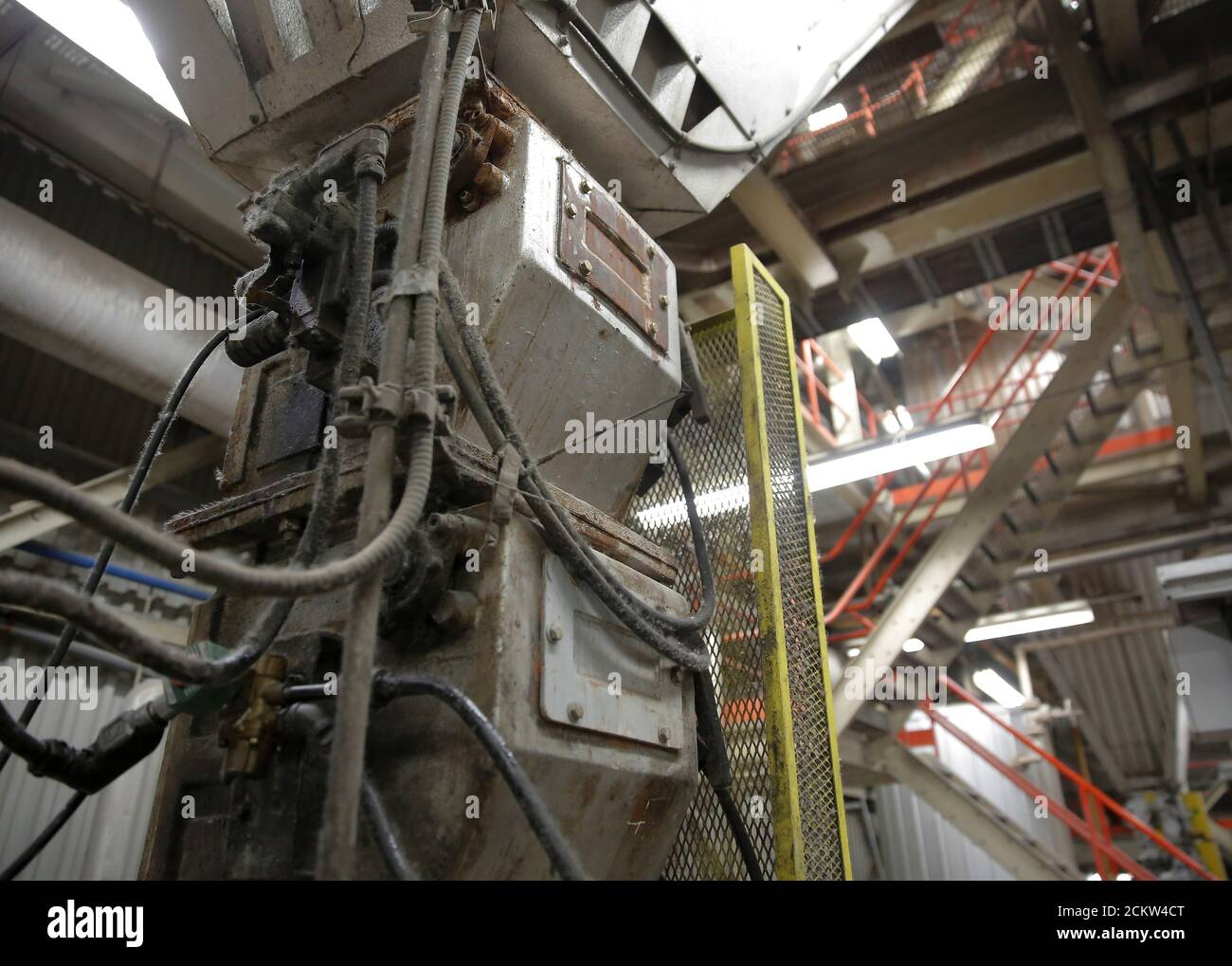A valve system moves ash away from the bottom of the 1200 degree Celsius combustion chamber at the Vancouver Waste-To-Energy garbage facility, where garbage shipped from the Philippines will be processed, in Burnaby, British Columbia, Canada, June 17, 2019.  REUTERS/Lindsey Wasson Stock Photo