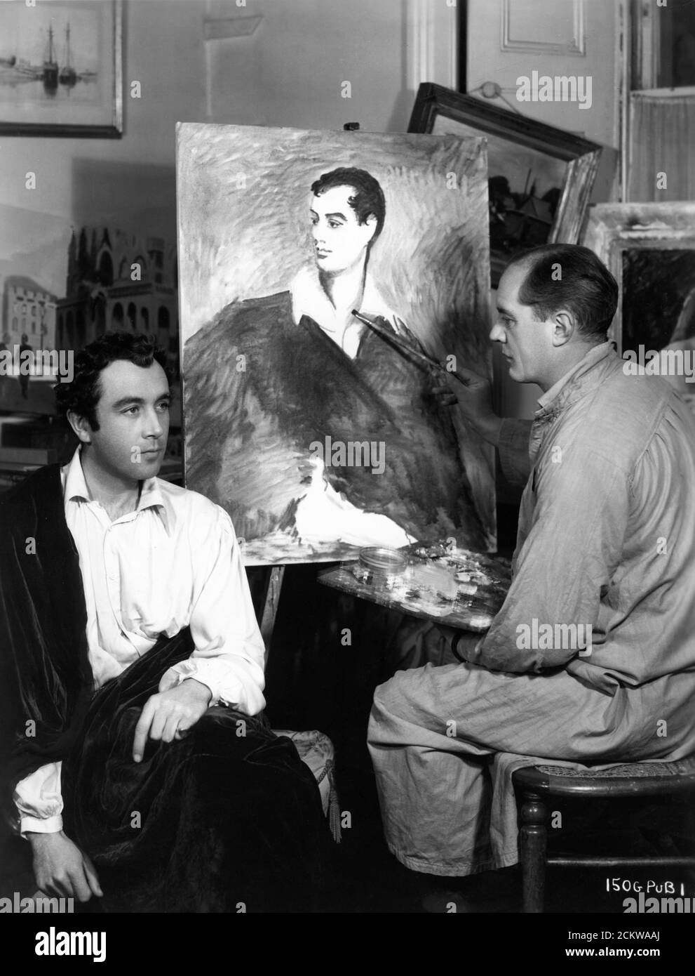 DENNIS PRICE having his  portrait painted as Byron by unidentified artist for THE BAD LORD BYRON 1949 director DAVID MacDONALD Sydney Box Productions / Gainsborough Pictures / General Film Distributors (GFD) Stock Photo