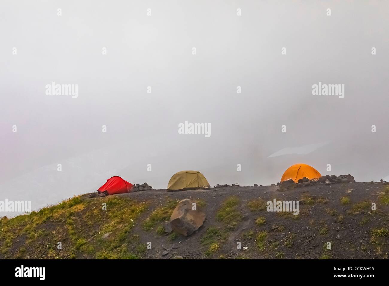 Tentsite used by climbers and backpackers in Hogsback Camp on Heliotrope Ridge below Mount Baker, Mount Baker-Snoqualmie National Forest, Washington S Stock Photo