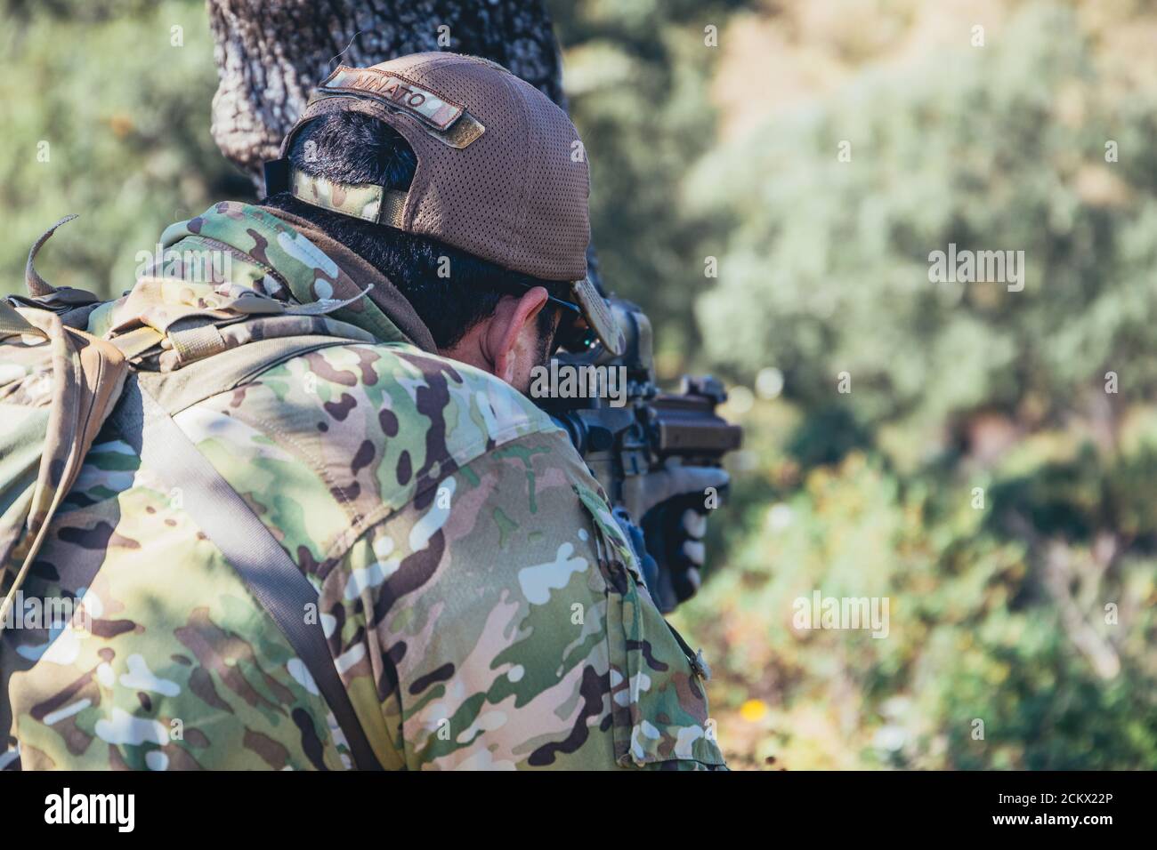 Closeup shot of military actions in the forest Stock Photo - Alamy