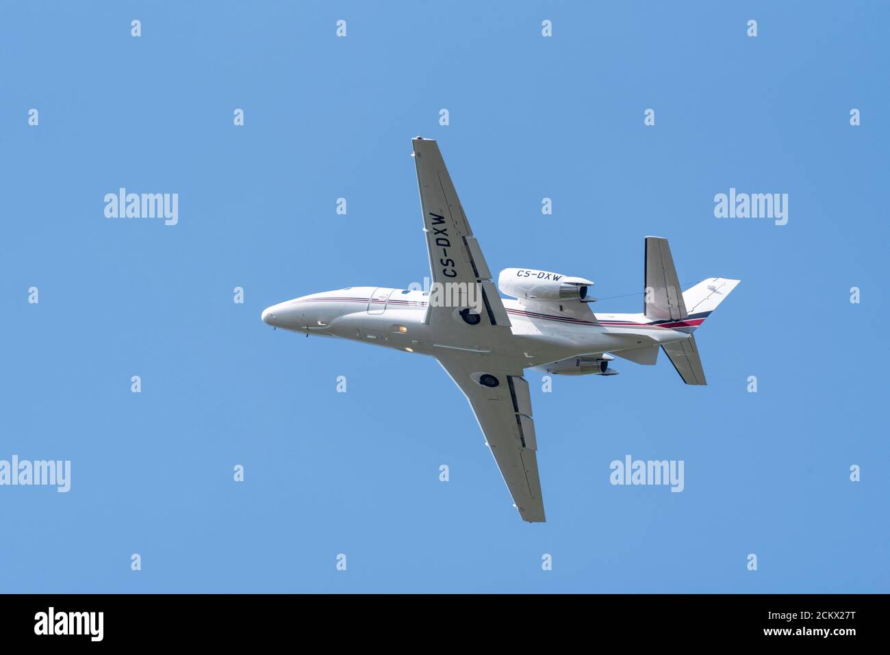 Cessna 560 Citation Excel business jet plane of Netjets Europe, CS-DXW, climbing away after taking off from Biggin Hill Airport, Kent, UK Stock Photo