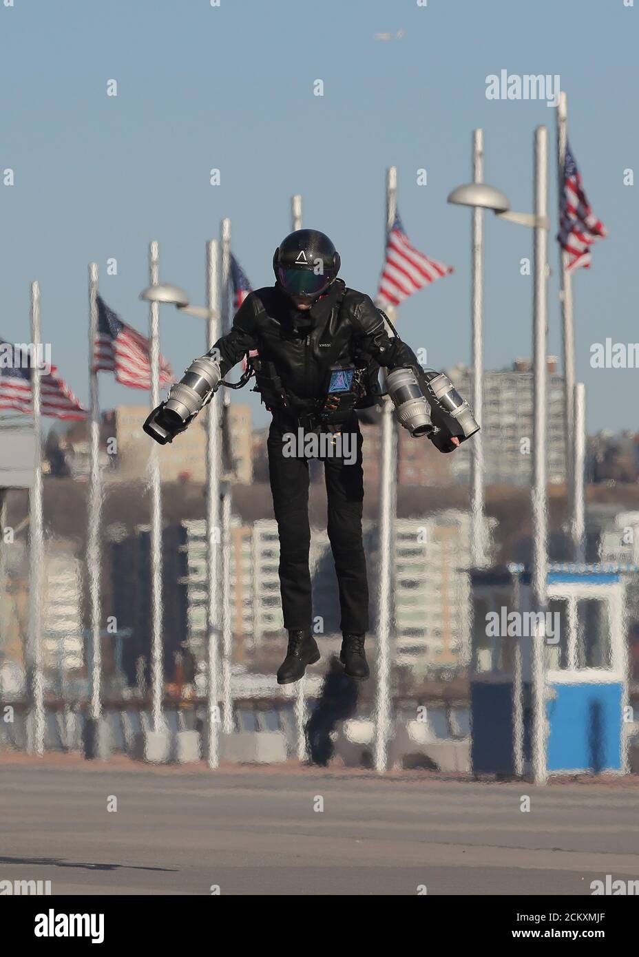 Sam Rogers, flight suit design engineer at Gravity Industries, demonstrates a Jet Suit at the Intrepid Sea, Air & Space Museum in New York, U.S., April 3, 2019. REUTERS/Brendan McDermid Stock Photo