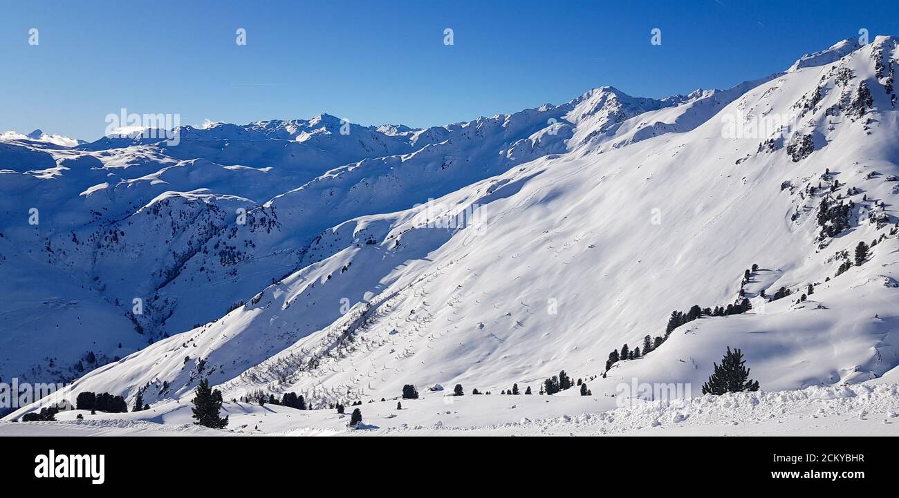 Mountain peaks covered in snow Stock Photo
