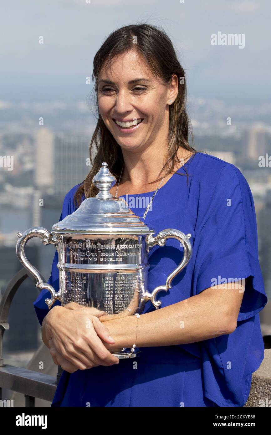 Flavia Pennetta of Italy poses with her women's U.S. Open Tennis champion trophy at the Top of the Rock in New York, September 13, 2015. Pennetta won her first grand slam singles title over Roberta Vinci in an improbable all-Italian U.S. Open final on Saturday then added one more shock to a stunning fortnight by announcing her retirement. REUTERS/Brendan McDermid Stock Photo